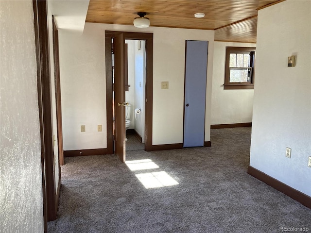 136 Cave Ave, Manitou Springs, CO 80829 - carpeted empty room with wood ceiling and baseboards