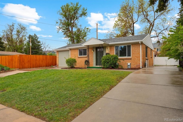 view of front of property with brick siding, concrete driveway, and a gate