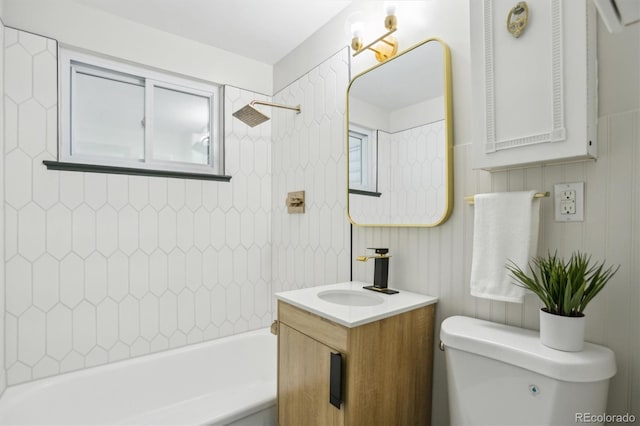 full bathroom with toilet, bathing tub / shower combination, and vanity