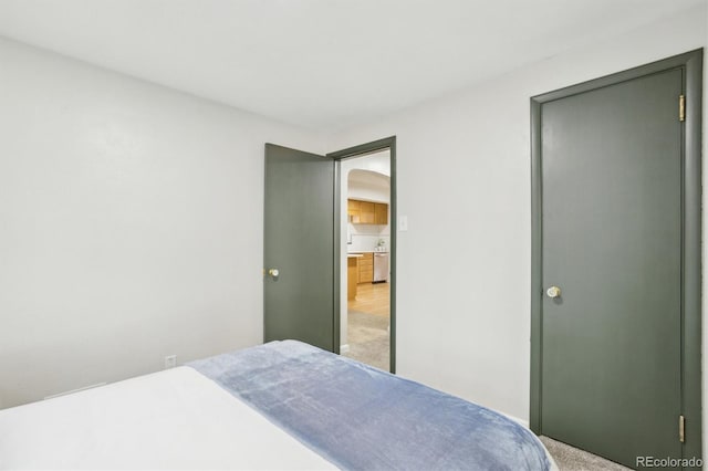 bedroom with light carpet