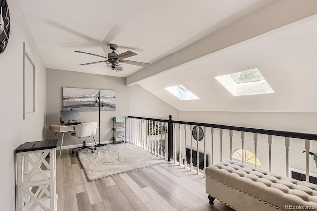 2890 W Long Cir Unit A, Littleton, CO 80120 - office space featuring a skylight, wood finished floors, and ceiling fan
