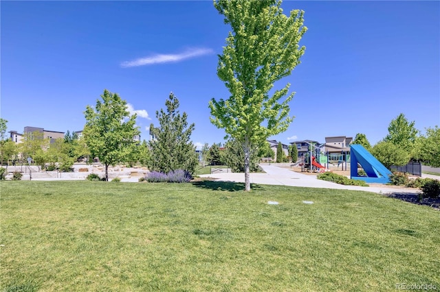6682 Osage St, Denver, CO 80221 - view of grassy yard featuring a playground