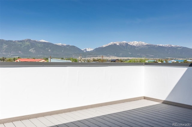 585 N Railroad St, Buena Vista, CO 81211 - wooden terrace featuring a mountain view