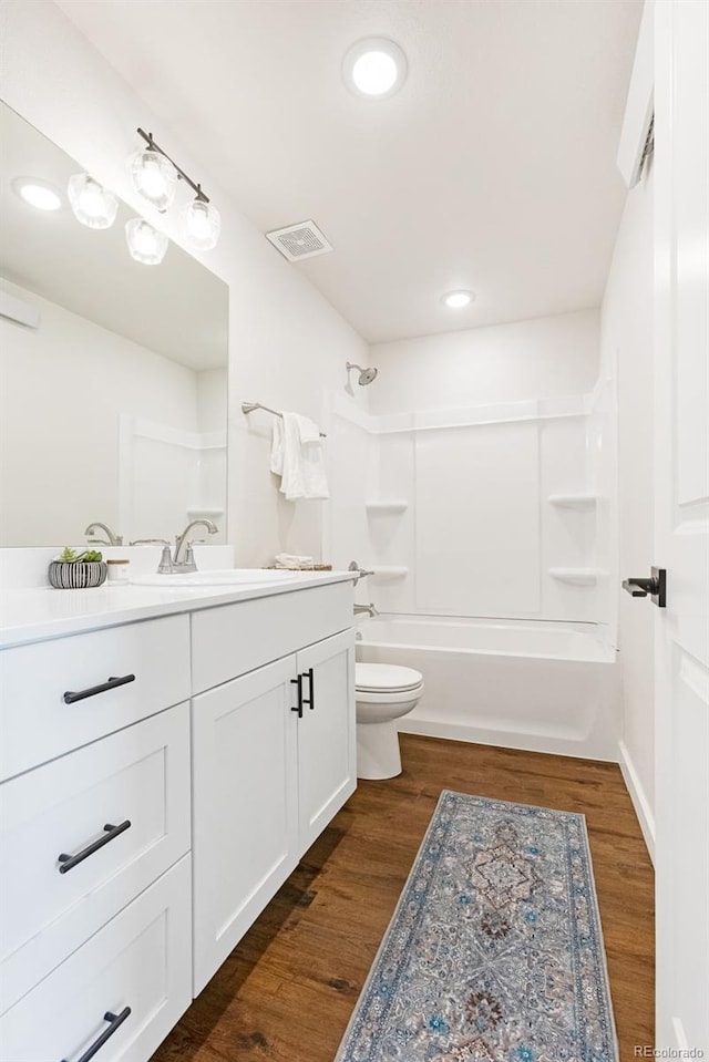 585 N Railroad St, Buena Vista, CO 81211 - full bathroom featuring vanity, shower / tub combination, recessed lighting, and wood finished floors