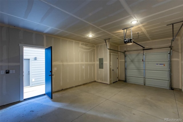 585 N Railroad St, Buena Vista, CO 81211 - garage featuring a garage door opener and electric panel