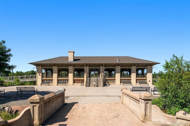 view of home's community with a patio