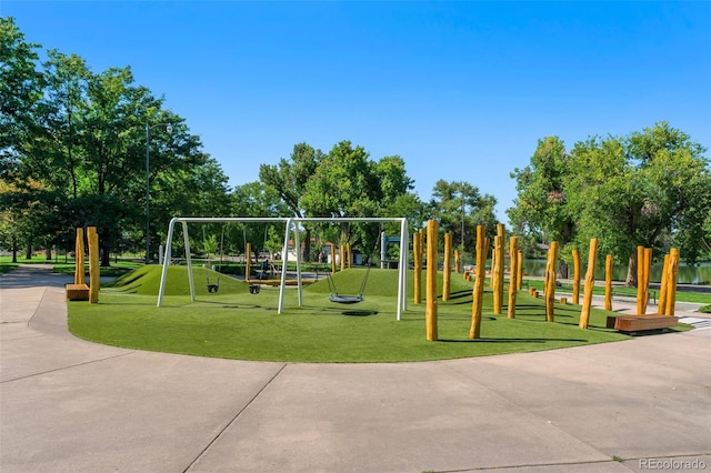 view of playground featuring a lawn