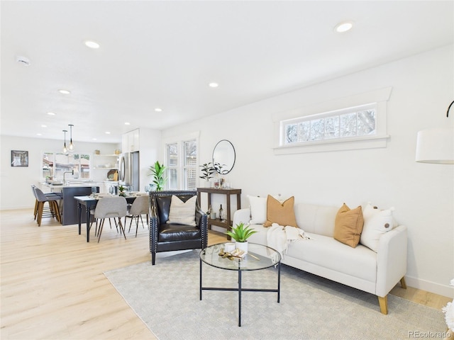 3150 S Pennsylvania St, Englewood, CO 80113 - living room featuring recessed lighting and light wood-type flooring