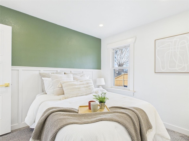 3150 S Pennsylvania St, Englewood, CO 80113 - bedroom featuring carpet flooring, wainscoting, a decorative wall, and recessed lighting