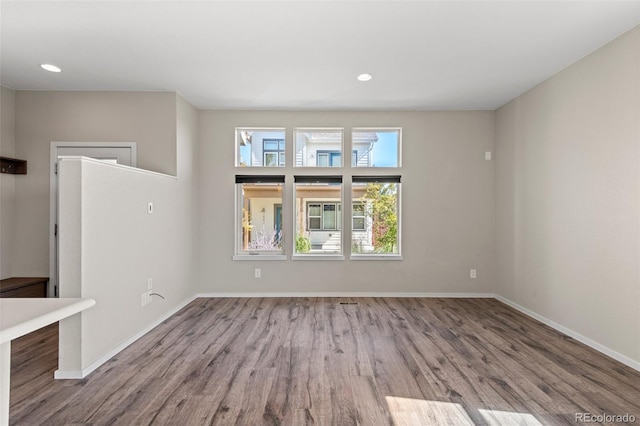 unfurnished living room with light wood-type flooring