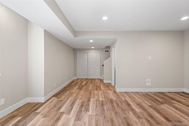 unfurnished room featuring light wood-type flooring