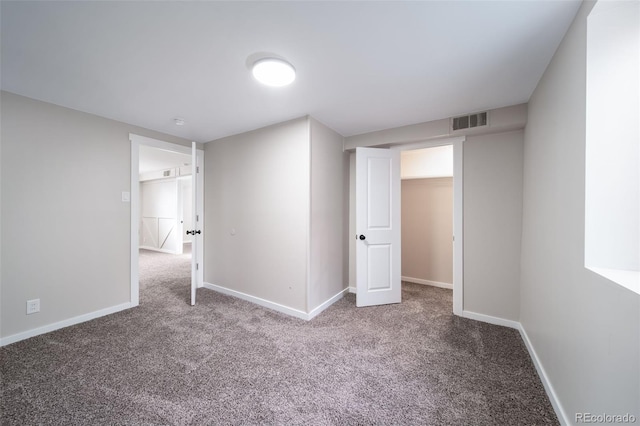 unfurnished bedroom with carpet floors