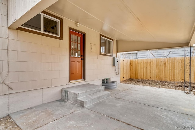 doorway to property featuring a patio area