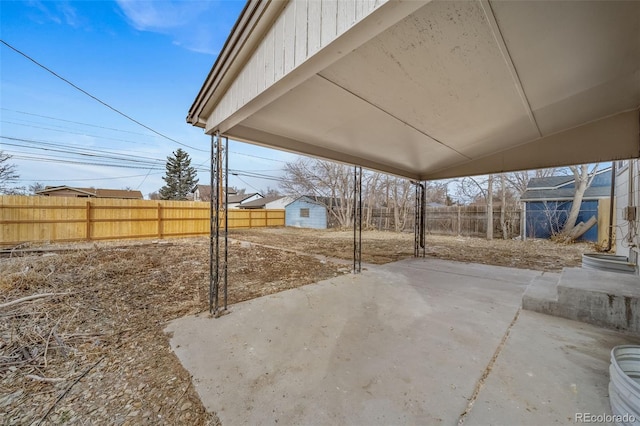 view of patio with a shed