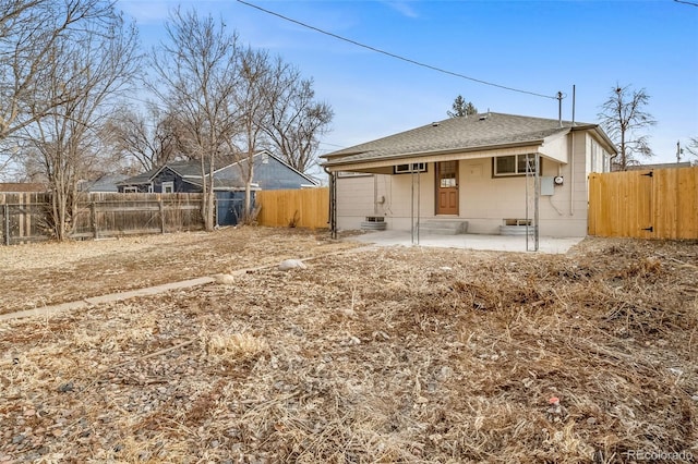 rear view of property with a patio