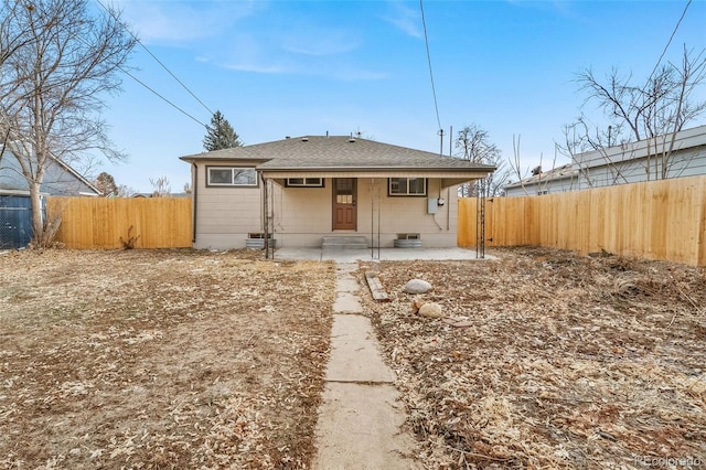 rear view of property with a patio area