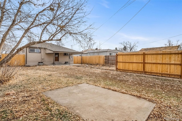 rear view of property featuring a patio