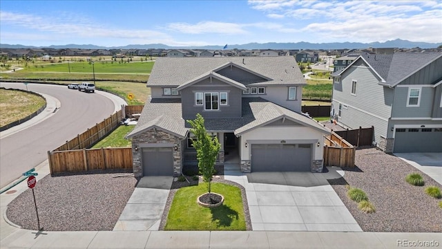 14601 Hudson St, Thornton, CO 80602 - craftsman-style house featuring stone siding, concrete driveway, roof with shingles, and a residential view