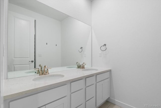 14601 Hudson St, Thornton, CO 80602 - bathroom with double vanity and tile patterned flooring