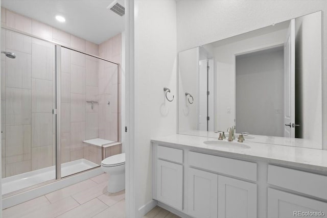 14601 Hudson St, Thornton, CO 80602 - full bathroom featuring a stall shower, vanity, and tile patterned flooring