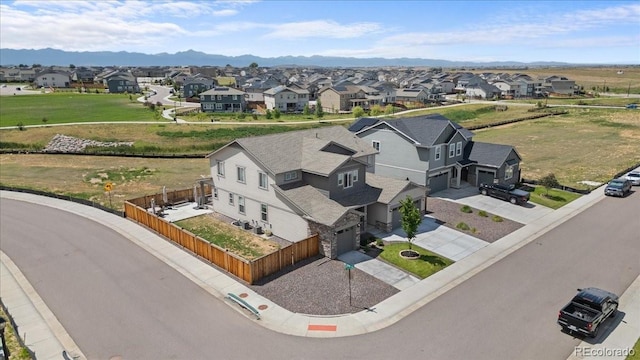 14601 Hudson St, Thornton, CO 80602 - aerial view of residential area with a mountain backdrop