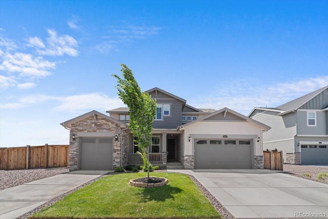 14601 Hudson St, Thornton, CO 80602 - craftsman house with stone siding, driveway, and an attached garage