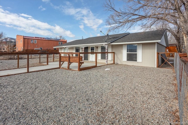 rear view of property featuring a patio