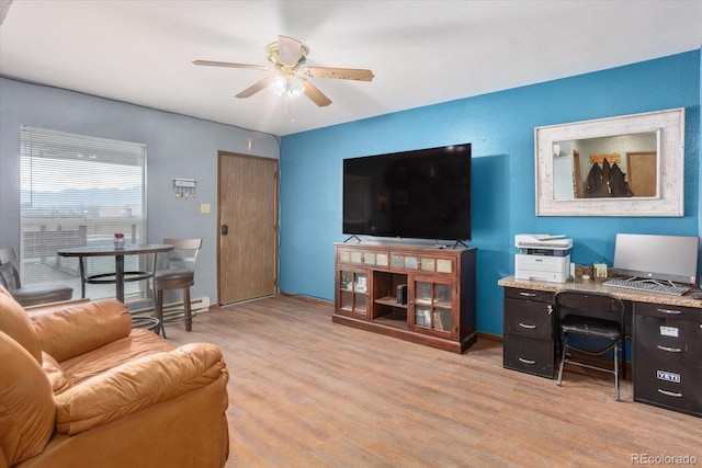 living room with ceiling fan and light wood-type flooring