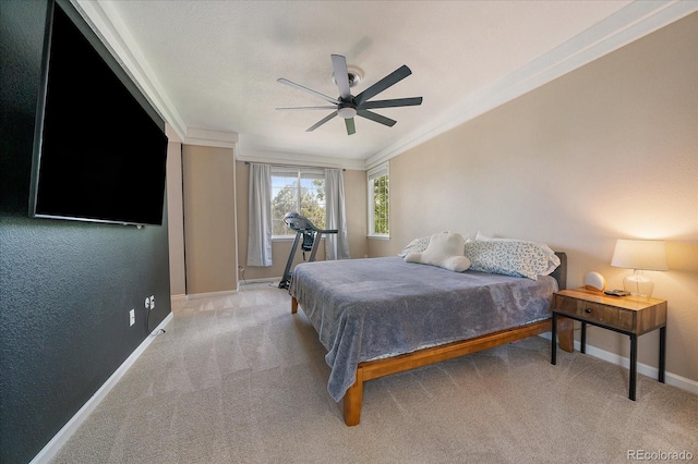 10610 Winterflower Way, Parker, CO 80134 - bedroom with baseboards, light colored carpet, ceiling fan, and ornamental molding