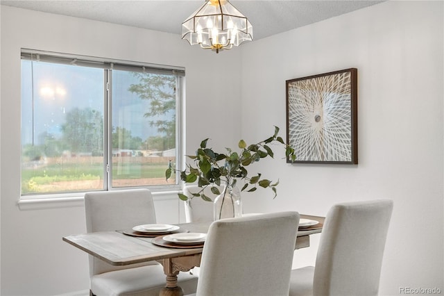 1741 W 131st Ct, Denver, CO 80234 - dining space featuring a chandelier