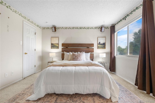 1741 W 131st Ct, Denver, CO 80234 - carpeted bedroom with a textured ceiling and baseboards