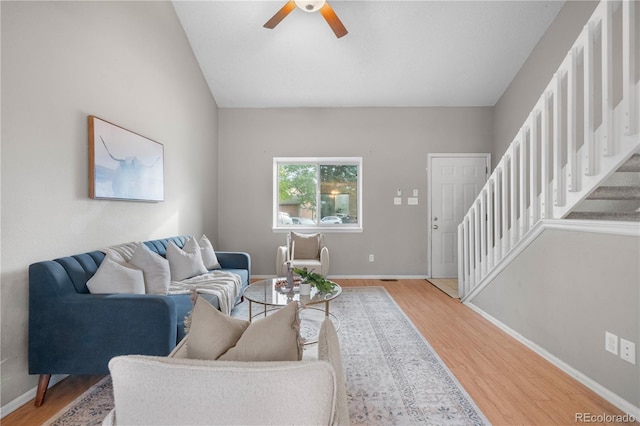 1741 W 131st Ct, Denver, CO 80234 - living area with wood finished floors, ceiling fan, and stairs