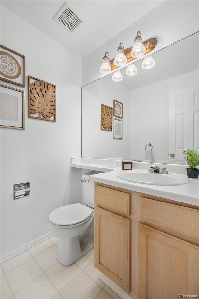 1741 W 131st Ct, Denver, CO 80234 - half bathroom featuring vanity and tile patterned flooring