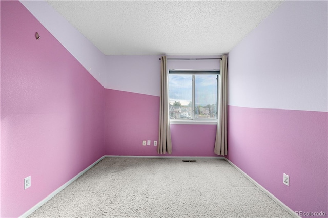 1741 W 131st Ct, Denver, CO 80234 - bonus room featuring a textured ceiling and carpet flooring