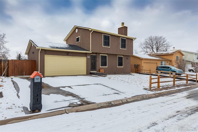 front of property featuring a garage