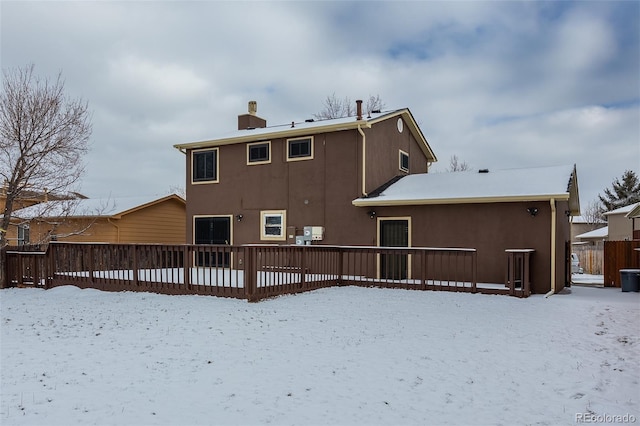 view of snow covered property