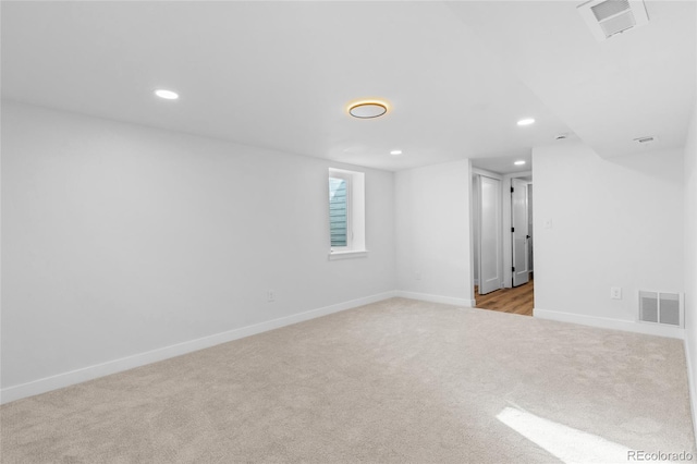 basement with light colored carpet