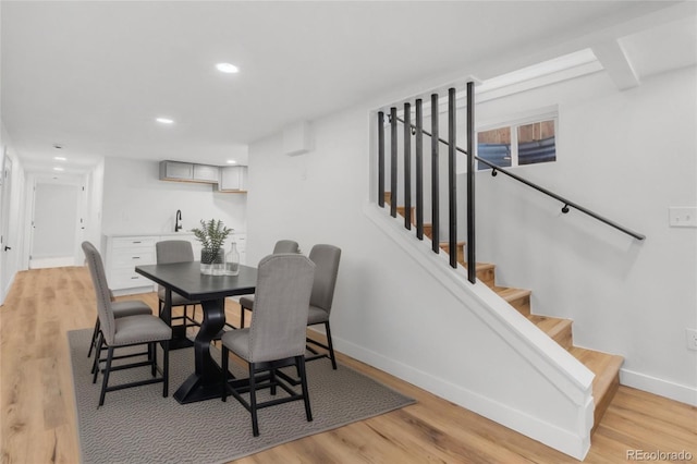 dining space featuring light hardwood / wood-style flooring