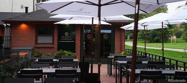 view of patio featuring outdoor dining area