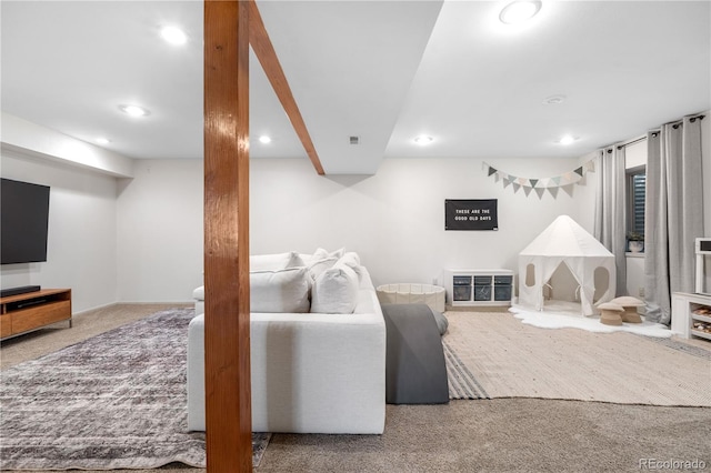 living area with carpet flooring and recessed lighting