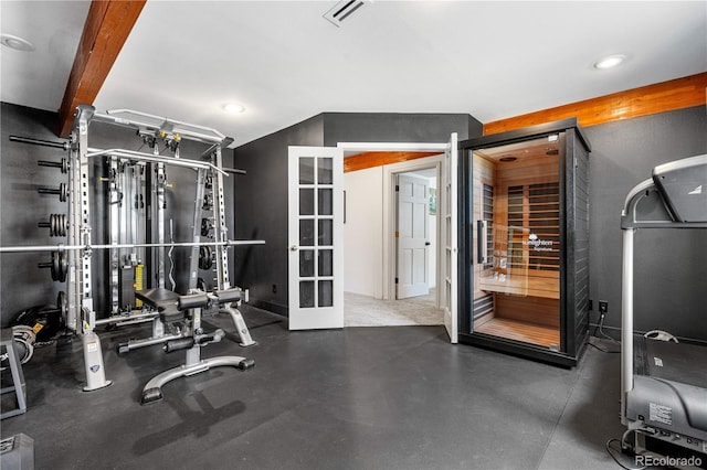 exercise room featuring visible vents, recessed lighting, and french doors