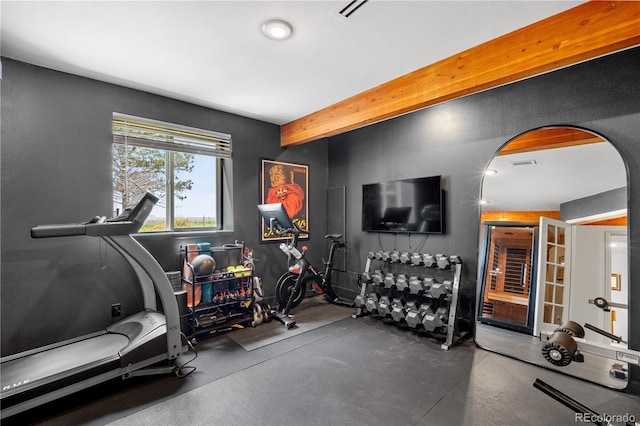 workout room with arched walkways and visible vents