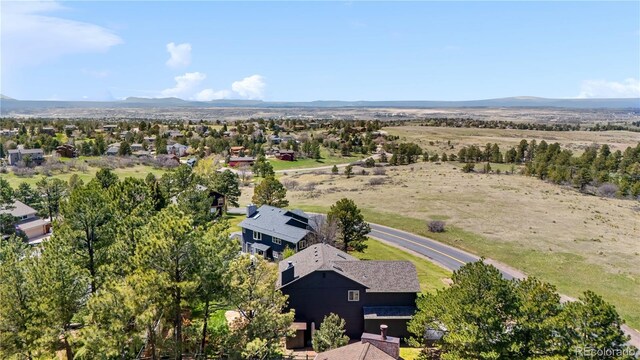bird's eye view with a mountain view and a residential view