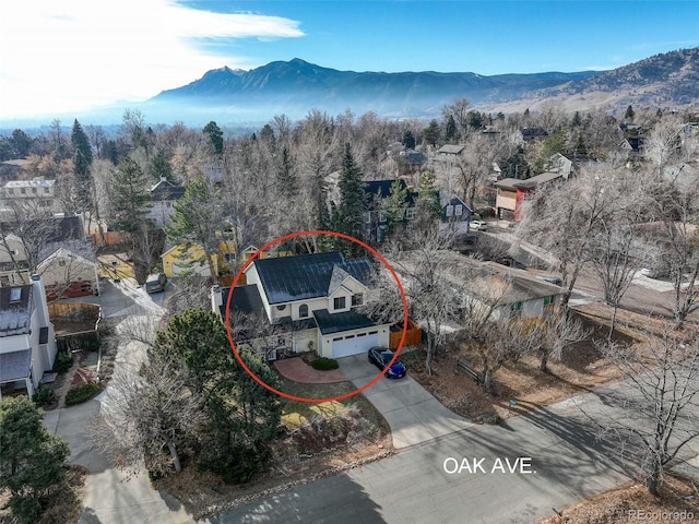 bird's eye view with a mountain view