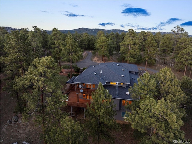 28890 Pinewood Vista Dr, Evergreen, CO 80439 - birds eye view of property with a view of trees