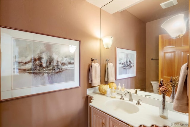 28890 Pinewood Vista Dr, Evergreen, CO 80439 - bathroom with vanity and toilet
