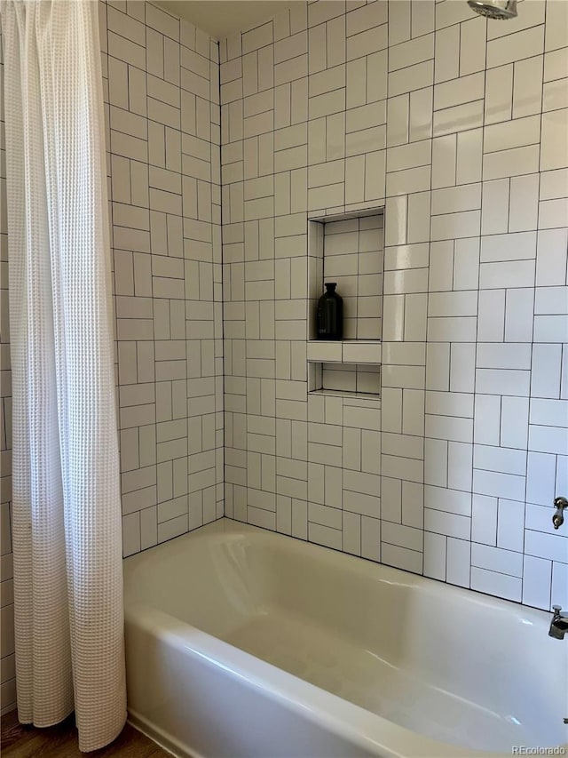 8503 E Jamison Ave, Centennial, CO 80112 - bathroom featuring shower / bath combination with curtain