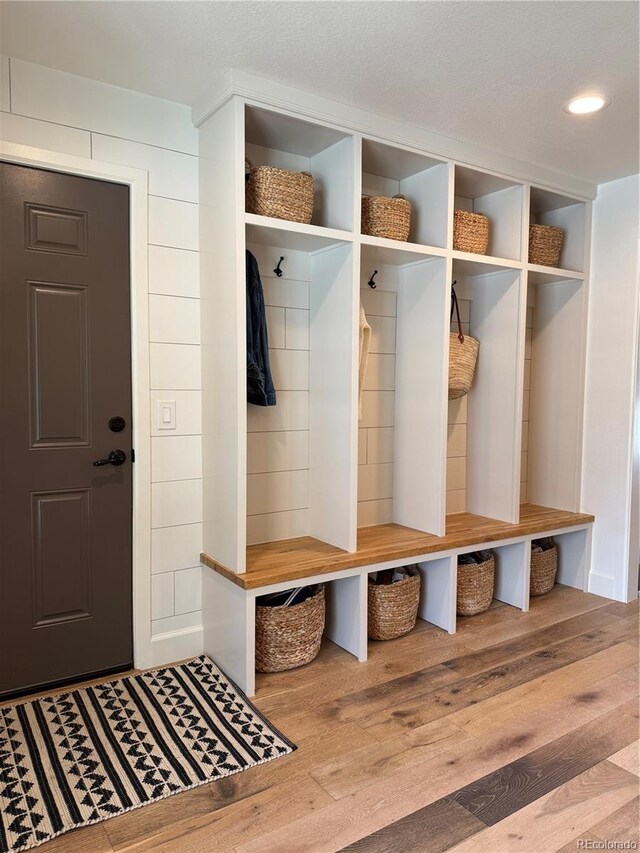 8503 E Jamison Ave, Centennial, CO 80112 - mudroom with recessed lighting and wood finished floors