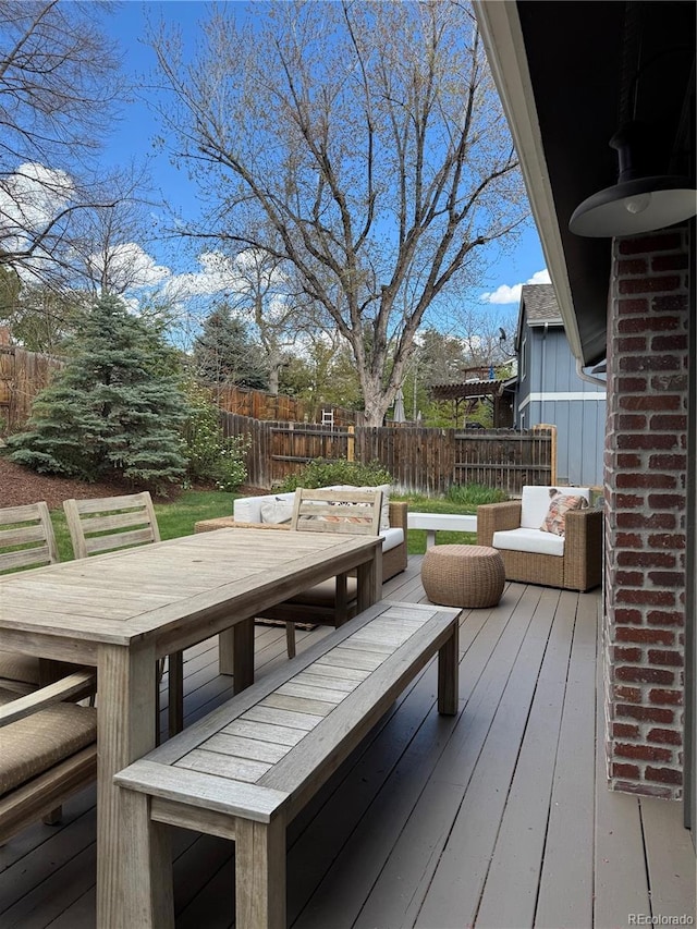 8503 E Jamison Ave, Centennial, CO 80112 - deck featuring a fenced backyard and outdoor dining space