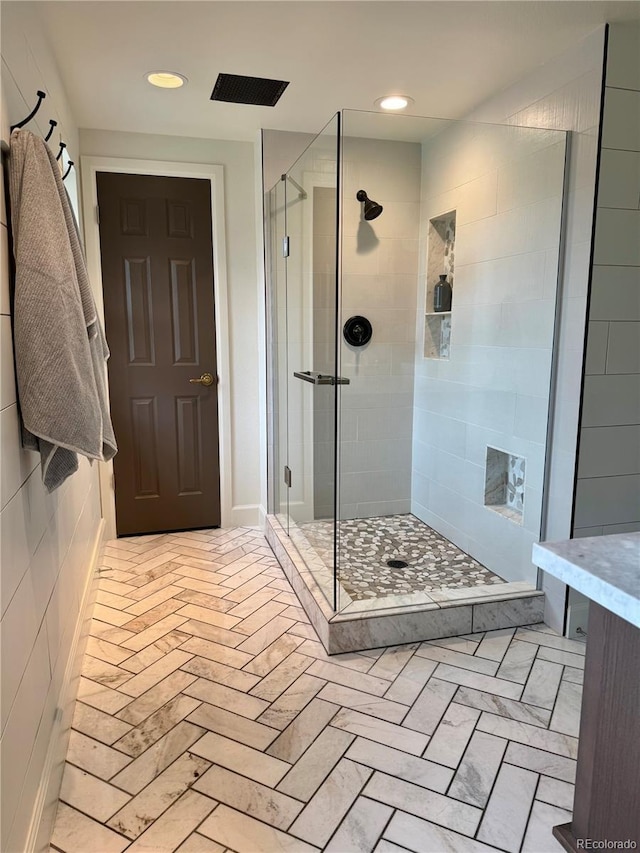 8503 E Jamison Ave, Centennial, CO 80112 - bathroom featuring recessed lighting and a stall shower